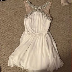 White dress with rhinestones and mesh straps